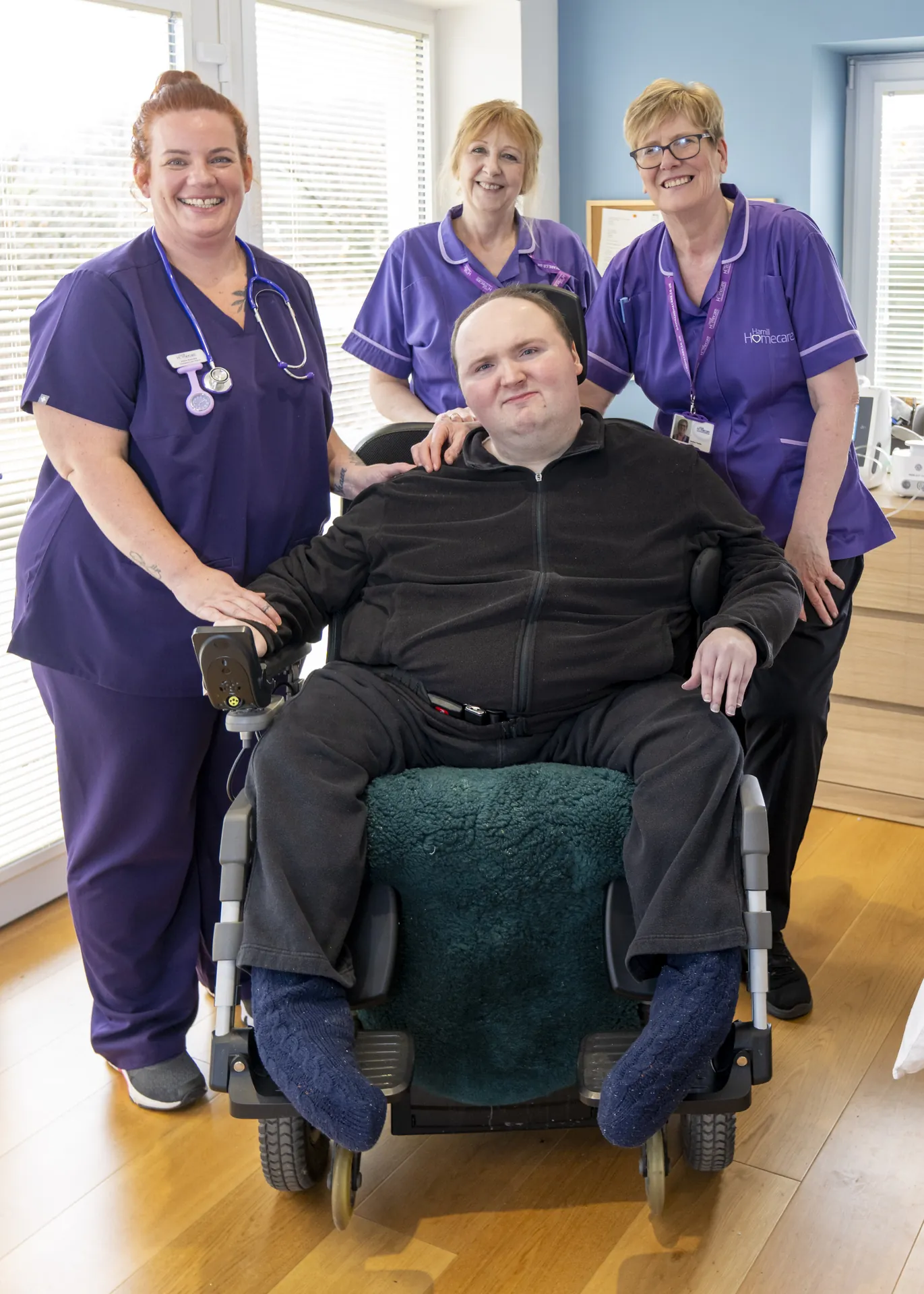 John at home with his Hamill Homecare complex care team